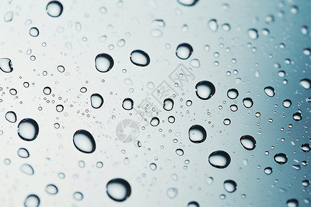 雨打玻璃玻璃上的雨水设计图片