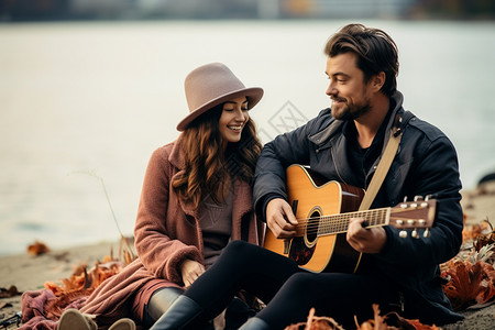 秋天湖边弹吉他的情侣高清图片