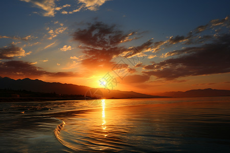 太阳下山的海滩背景图片