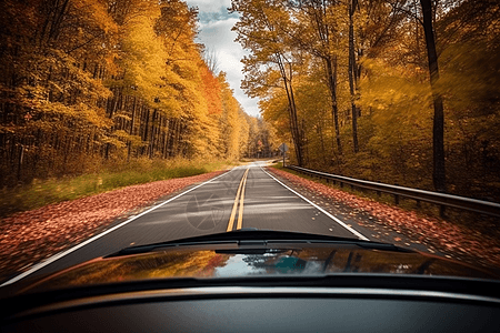 蜿蜒曲折道路上的轿车图片