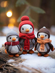 雪地中的可爱针织企鹅图片