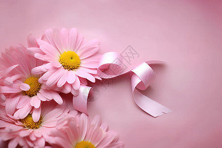 一束粉红花朵上系着蝴蝶结图片
