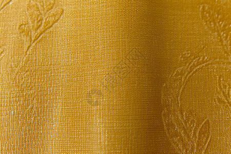 金黄色纹理布料织物背景图片