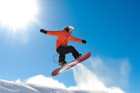 雪山单板滑行的飞跃动作高清图片