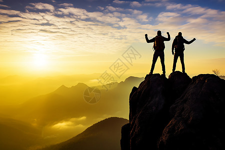 登山者征服高山图片