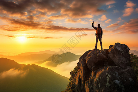 站在岩石上站在山顶上的攀登者背景