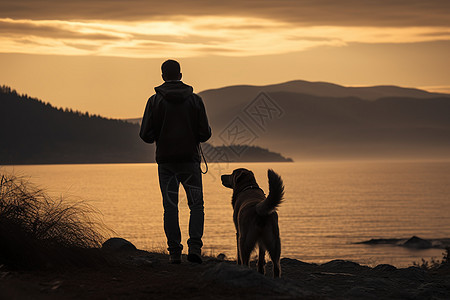 男人和他的狗看日落图片