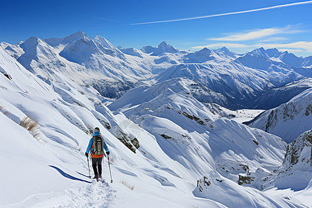 山脉上的登山运动装背景图片