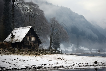 白雪覆盖的乡村小屋高清图片