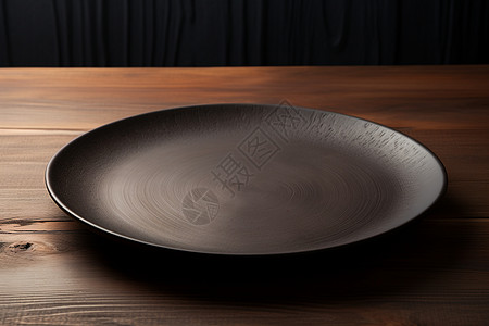 黑色磨砂圆形磨砂的黑色陶瓷餐具背景