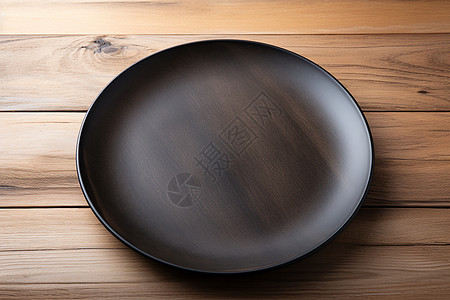 黑色桌面极简主义的黑色木质餐盘背景