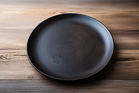 黑色极简桌面上的黑色木质餐盘背景