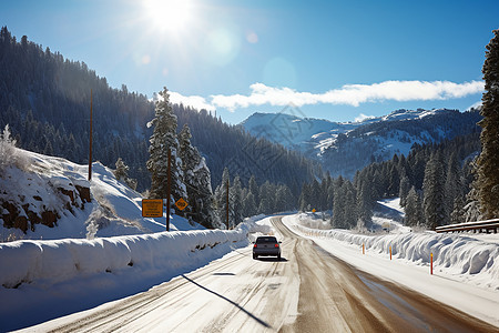 冬季雪山公路上的汽车图片