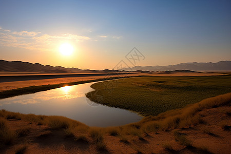 沙丘上的落日景观图片