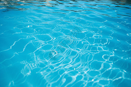 清澈泳池的层层涟漪图片