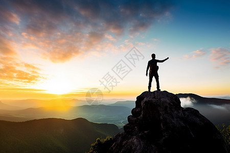 登顶山峰的人图片