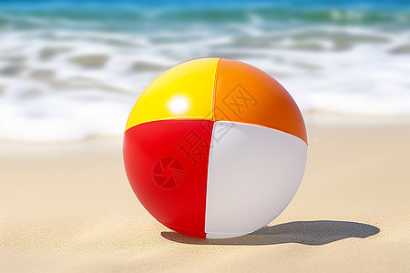 夏日海滩上的沙滩球高清图片