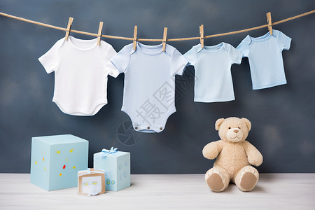 婴儿衣服和礼物背景图片