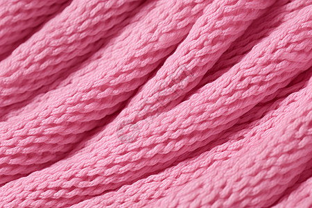 毛织品粉色的柔软织物背景