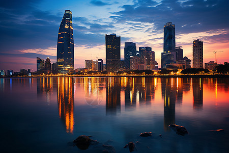 夜幕下国会大厦夜幕下的湖畔城市背景