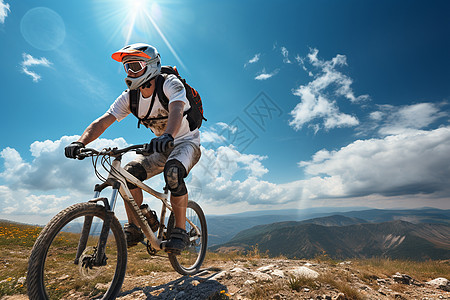 男子健身男子骑车登上山顶背景