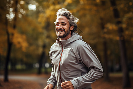 秋天公园里跑步的男人图片