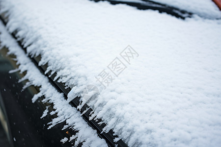 大雪后车顶覆盖的积雪背景