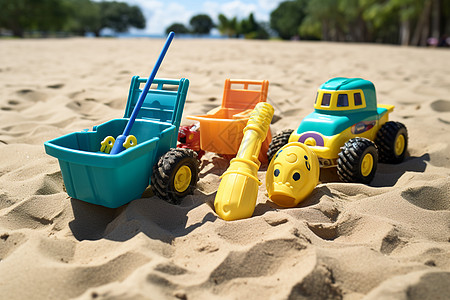 夏季沙滩上的塑料玩具图片