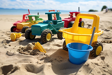 沙滩烧烤海边沙滩上的儿童玩具背景