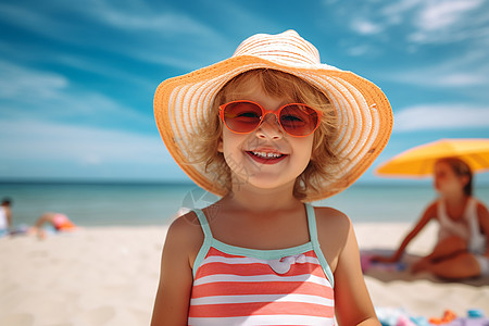 沙滩上开心快乐的小女孩图片
