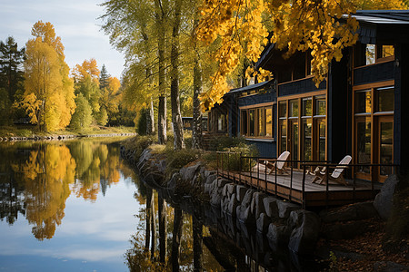 秋天湖边秋天湖畔的小屋背景