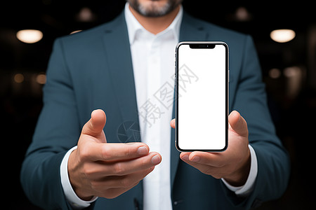 男士手中握着一部手机图片