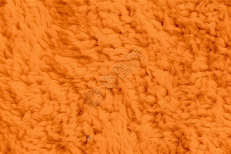 柔软的橙色奢华面料背景图片