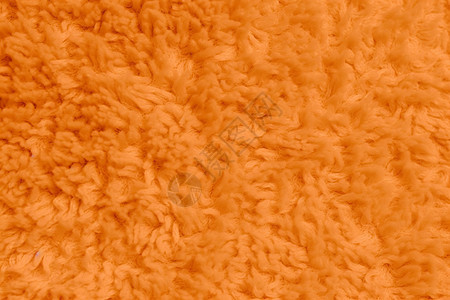 橙色地毯的特写背景图片