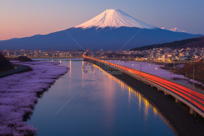 城市上方的富士山景观图片