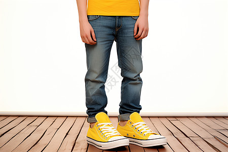 男孩穿着黄色帆布鞋背景图片