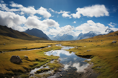 溪流穿过绿色山谷背景图片