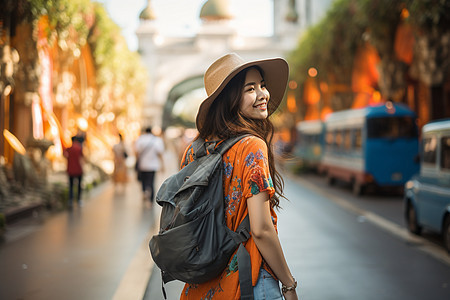 阳光下的背包女孩背景图片