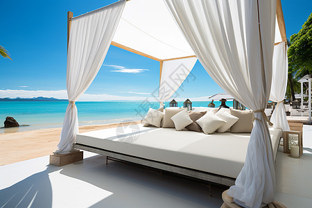 沙滩上舒适的大床背景图片