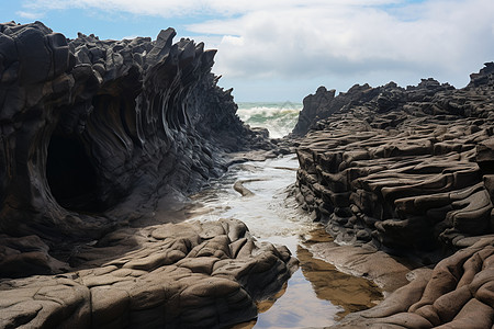 海边岩石海边崎岖的巨石背景