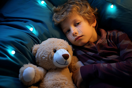 抱玩具熊男孩孩子抱着泰迪熊睡觉背景