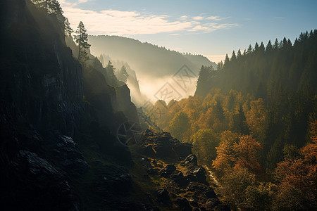 山峦云雾缭绕的山谷景观图片