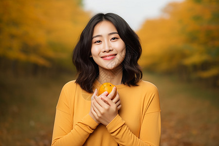 手持水果的女孩图片