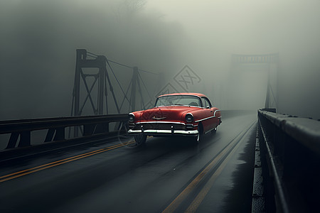 红车穿过迷雾缭绕的吊桥图片