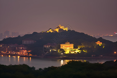 夜幕下的海港城市建筑景观背景图片