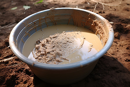 泥浆盆中的水泥背景图片
