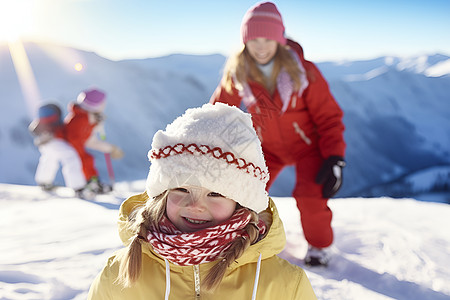 冬季雪山中滑雪的一家三口高清图片