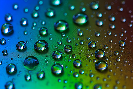 彩虹背景的水滴图片