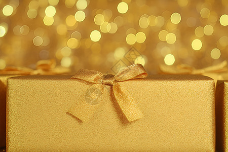 闪耀的金色礼盒图片