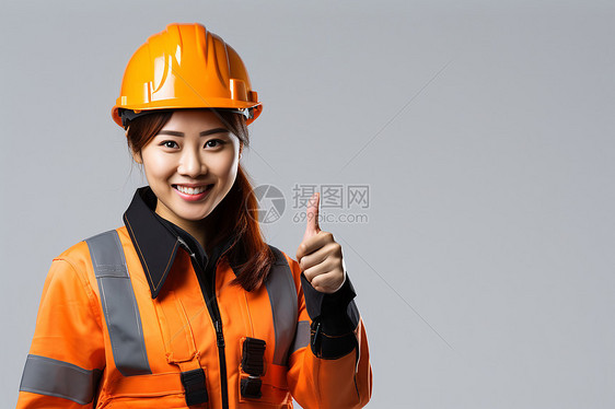 一名女建筑师戴着安全头盔图片